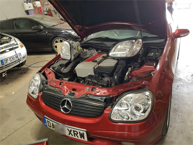 Headlights being changed on Mercedes SLK 230 Mercedes SLK 230 with headlights
